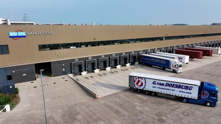 GD-iTS building with loading docks and trailers in front
